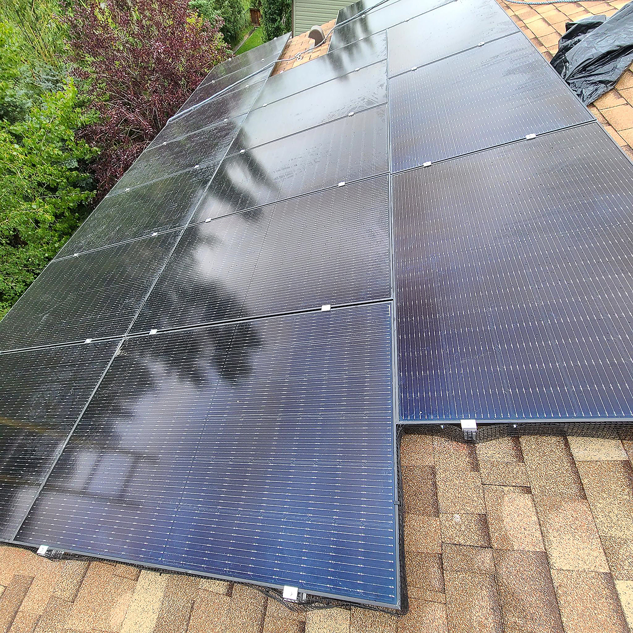 Crew Technical Services team providing rooftop residential solar panel installations in Calgary.