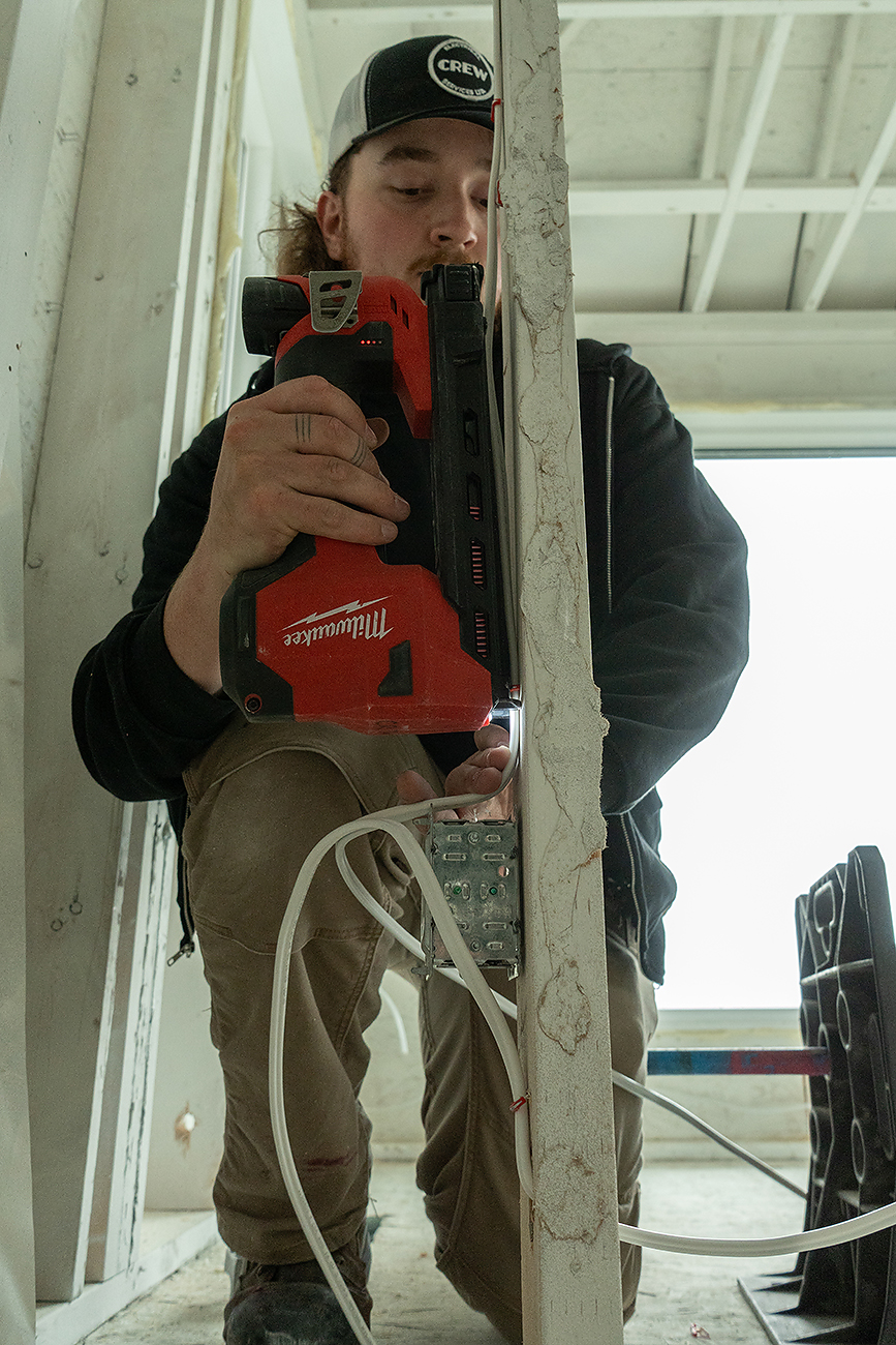 Electrical for Home Renovations in Calgary | Crew Technical Services Altadore basement renovation electrical planning by Crew Technical Services with recessed lighting and media wall