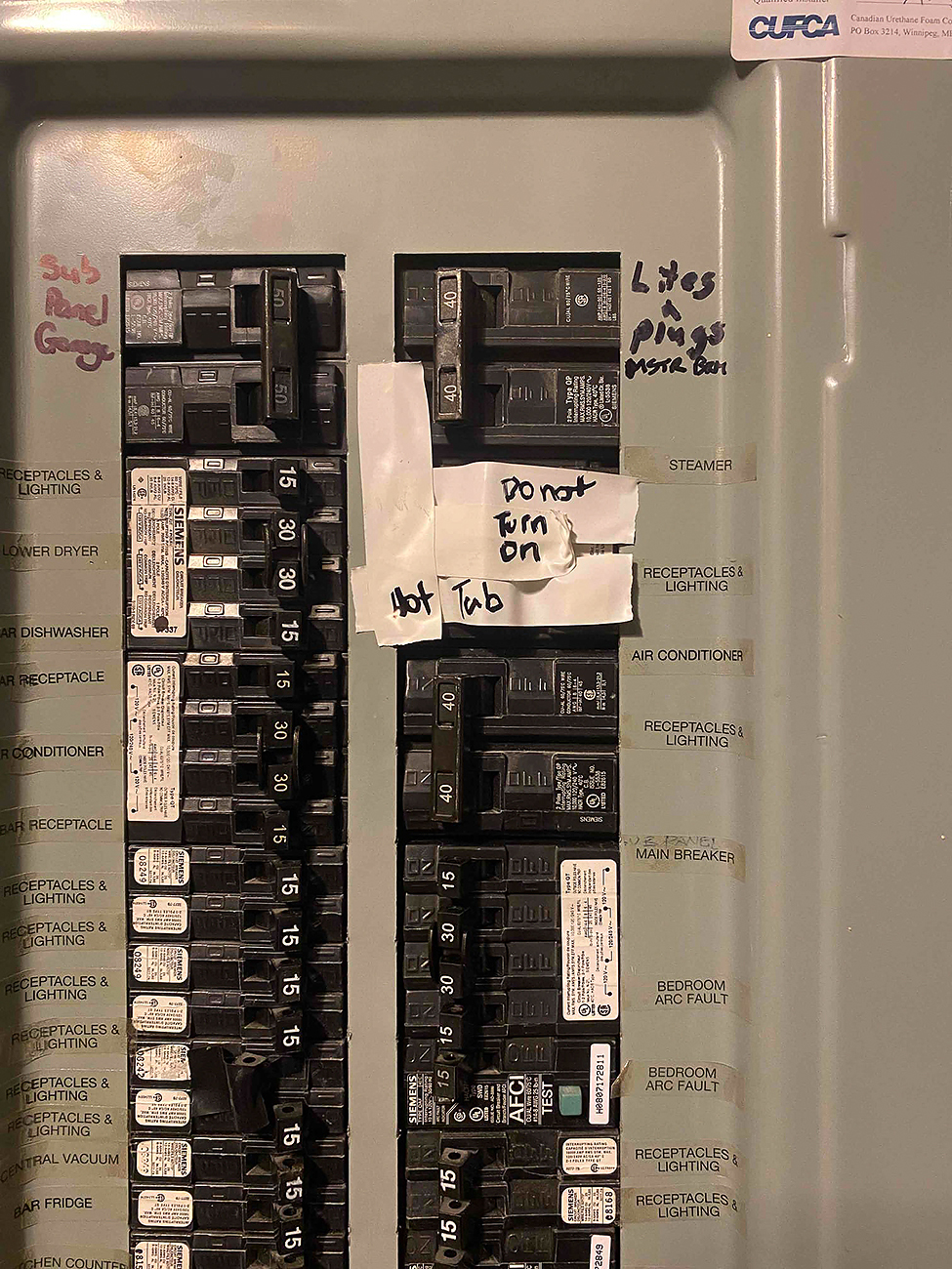 Professional Hot Tub Wiring & Installation in Calgary | Crew Technical Services 200 amp electrical panel upgrade in Southwest Calgary by Crew Technical Services with clean labeling