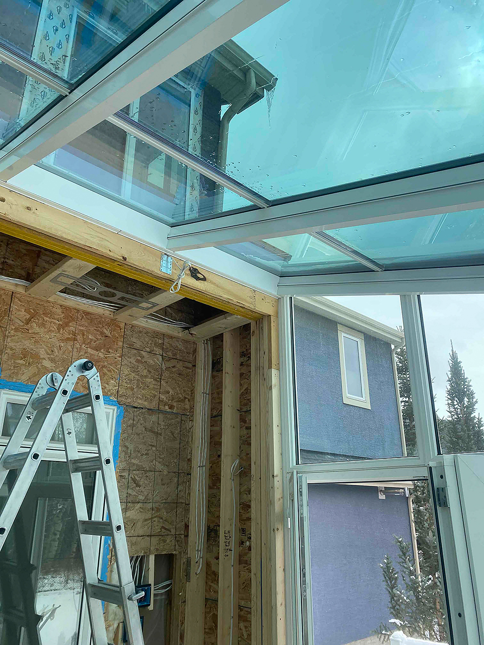 Electrical for Home Renovations in Calgary | Crew Technical Services Crew Technical Services meeting a Calgary electrical inspector after a rough-in