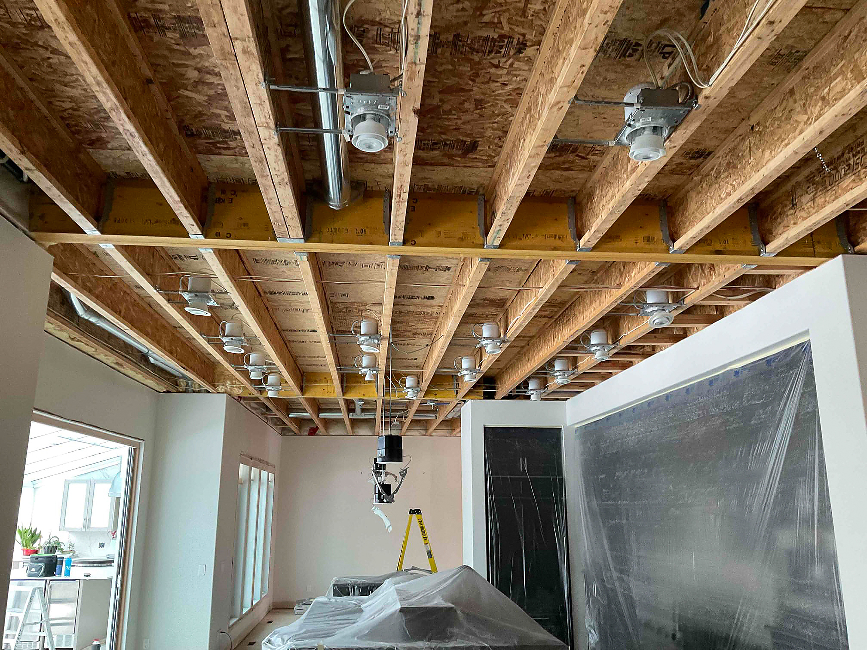 Crew Technical Services wiring rough-in for a Springbank Hill renovation