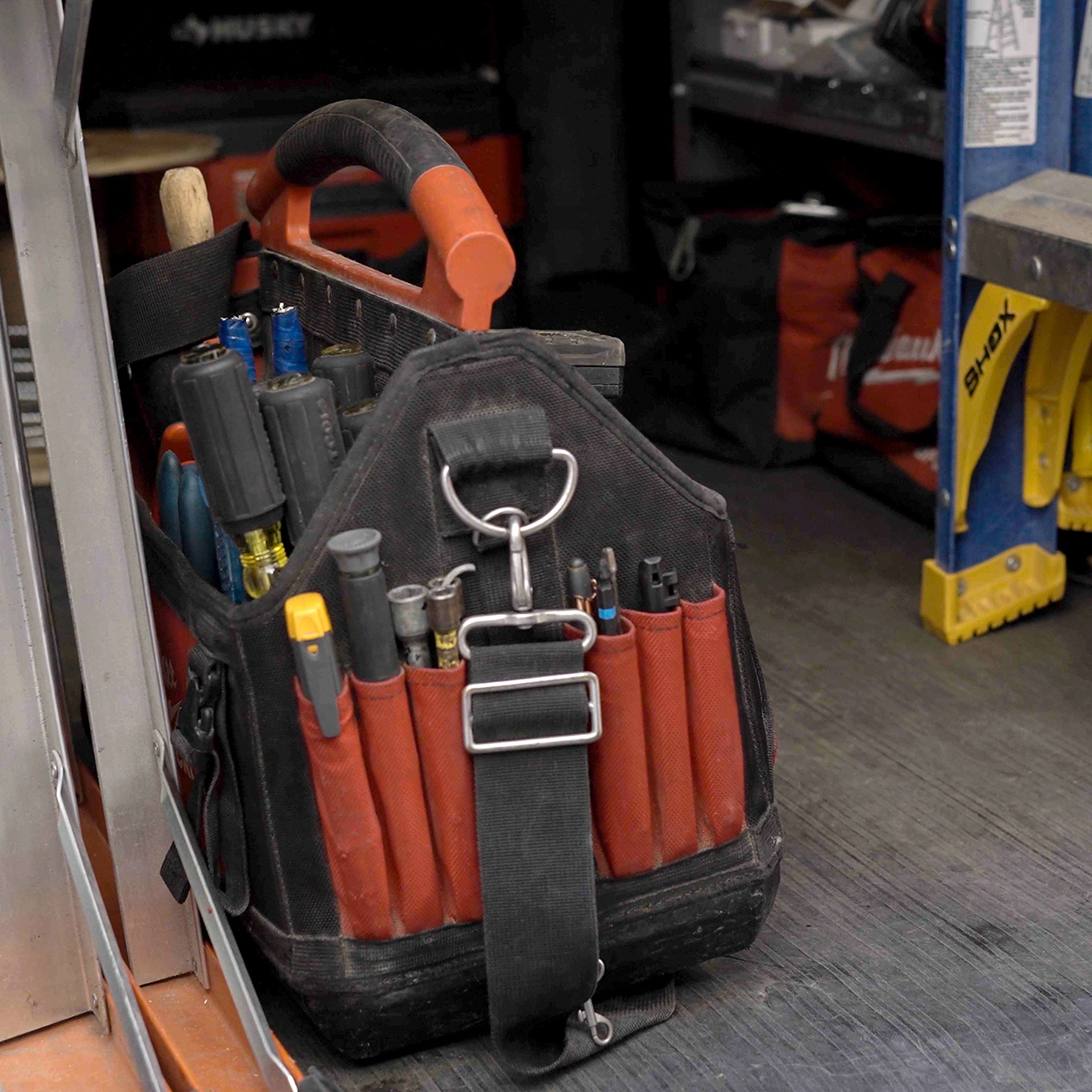 Crew Technical Services electrician arriving in a company van for a Calgary service call