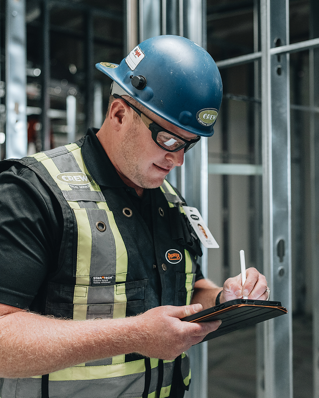 Commercial electrician from Crew Technical Services servicing a building in Calgary
