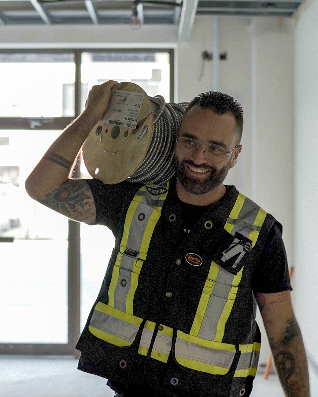 Crew Technical Services electrician working in a Currie Barracks infill home in Calgary