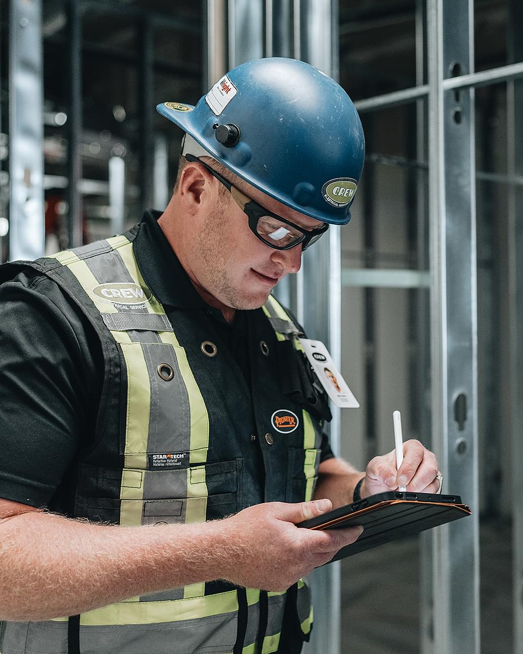 Commercial electrician from Crew Technical Services servicing a building in Calgary