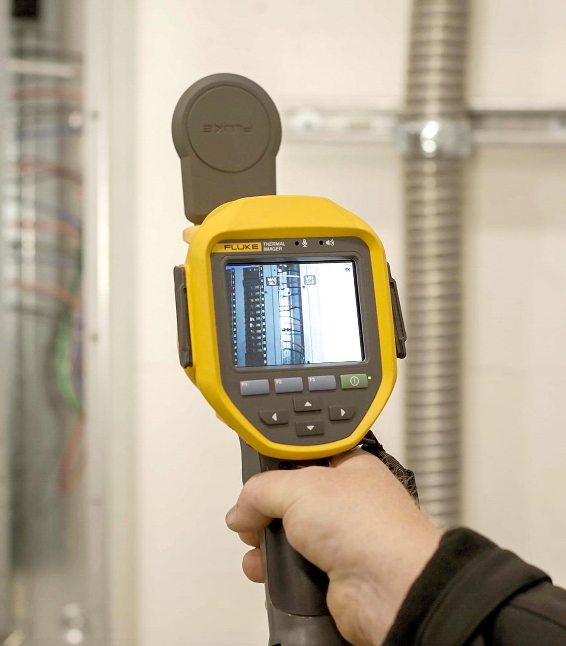 Crew Technical Services electrician working in an Evanston home in northwest Calgary